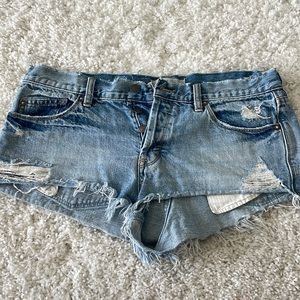 Free People low rise button up jean shorts size 9